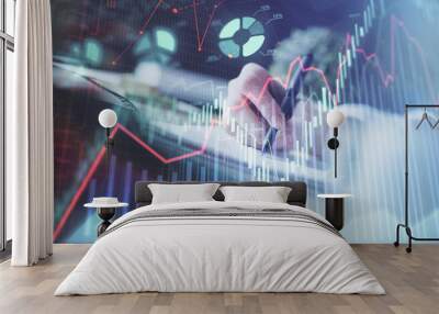 Financial forex graph displayed on hands taking notes background. Concept of research. Multi exposure Wall mural