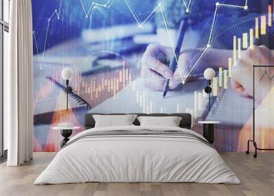 Financial forex graph drawn over hands taking notes background. Concept of research. Multi exposure Wall mural