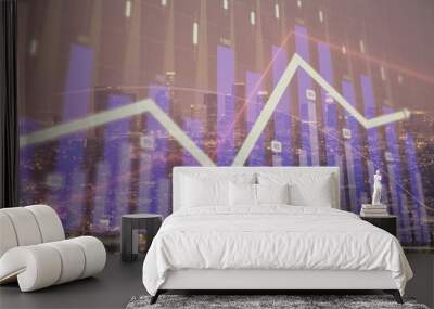 Financial graph on night city scape with tall buildings background double exposure. Analysis concept. Wall mural