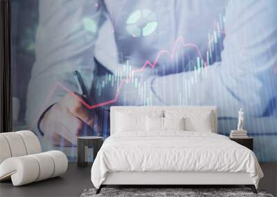 Financial trading chart multi exposure with man desktop background. Wall mural