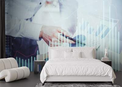 Financial trading graph double exposure with man desktop background. Wall mural