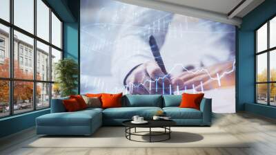 Financial trading graph multi exposure with man desktop background. Wall mural