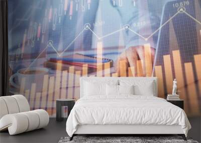 Forex graph with businessman working on computer in office on background. Concept of hardworking. Multi exposure. Wall mural