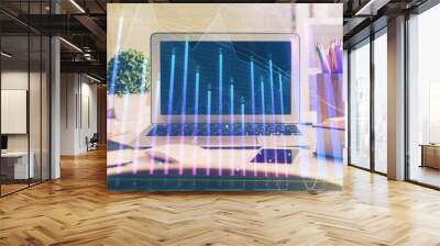 Forex market graph hologram and personal computer on background. Multi exposure. Concept of investment. Wall mural