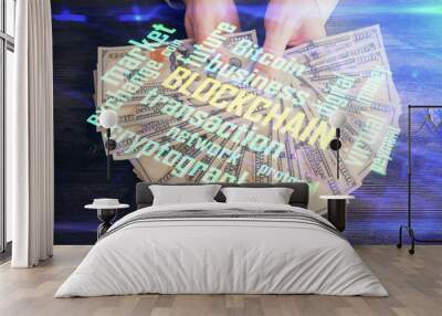 Multi exposure of blockchain theme drawing hologram and USA dollars bills and man hands. Business concept. Wall mural