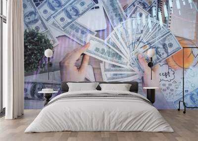 Multi exposure of financial graph drawing hologram and USA dollars bills and man hands. Analysis concept. Wall mural