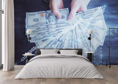 Multi exposure of financial graph drawing hologram and USA dollars bills and man hands. Analysis concept. Wall mural