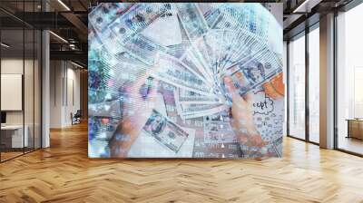 Multi exposure of financial theme drawing hologram and USA dollars bills and man hands. Business concept. Wall mural