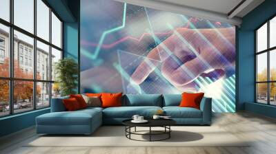 Multi exposure of man's hands holding and using a phone and financial chart drawing. Market analysis concept. Wall mural