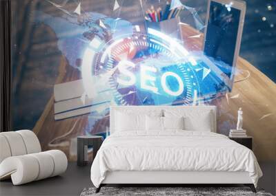 Multi exposure of table with computer and seo drawing hologram. Search optimization concept. Wall mural