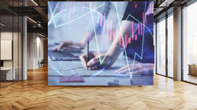 Multi exposure of woman hands typing on computer and financial chart hologram drawing. Stock market analysis concept. Wall mural