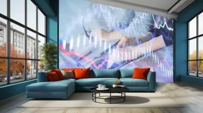 Multi exposure of woman hands typing on computer and financial chart hologram drawing. Stock market analysis concept. Wall mural