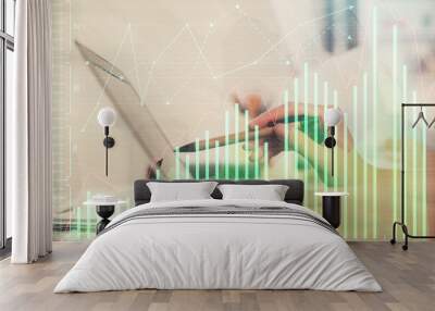 Multi exposure of woman hands typing on computer and financial graph hologram drawing. Stock market analysis concept. Wall mural