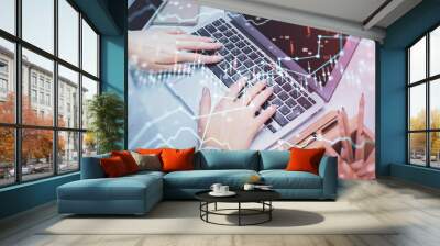 Multi exposure of woman hands typing on computer and forex chart hologram drawing. Stock market analysis concept. Wall mural