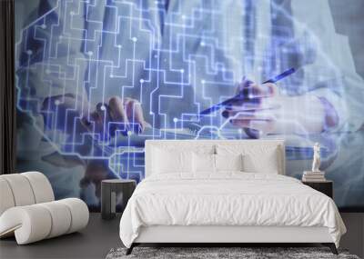 Multi exposure of writing hand on background with brain hologram. Concept of self learning. Wall mural