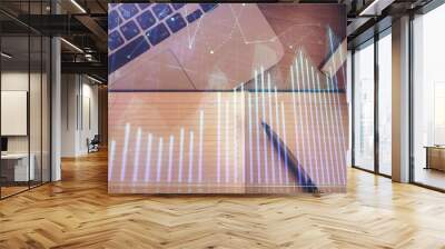 Stock market chart and top view computer on the table background. Double exposure. Concept of financial analysis. Wall mural