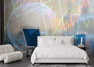 Stock market chart hologram drawn on personal computer background. Double exposure. Concept of investment. Wall mural