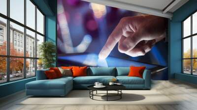 tablet in hand Wall mural