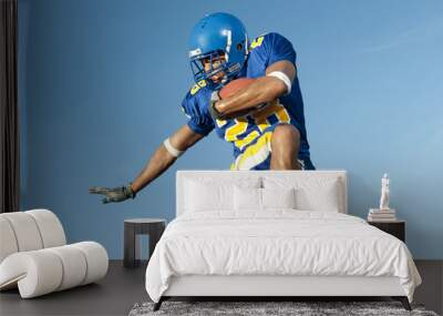 Football player in game action Wall mural