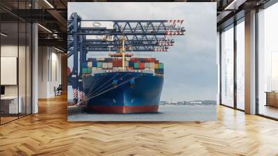 cargo ship at dock waiting to be unloaded Wall mural