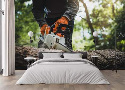 Cordless Chainsaw. Close-up of woodcutter sawing chain saw in motion, sawdust fly to sides. Chainsaw in motion. Hard wood working in forest. Sawdust fly around. Firewood processing. Wall mural