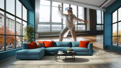 Futuristic vision of VR AR home sports / workout, beautiful woman has fun making virtual sports at home with her immersive technology VR/AR headset, created with Generative AI
 Wall mural