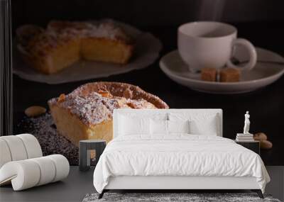 homemade almond frangipane cake in selective lighting Wall mural