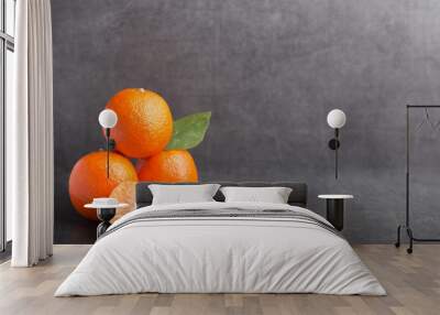 mandarin on a grey stone table Wall mural