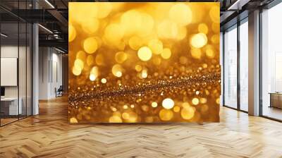 Sparkling golden glitter texture with shimmering particles creating a luxurious effect Wall mural