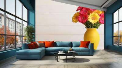 A cheerful bunch of gerbera daisies in a bright yellow vase, bringing a pop of color to any room, gerbera daisies, yellow vase, cheerful Wall mural