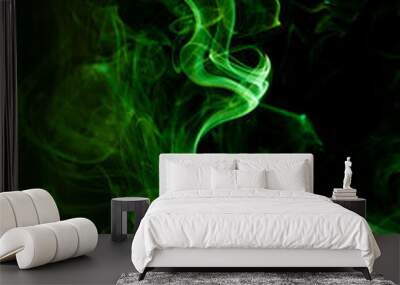 Green smoke motion on black background. Wall mural