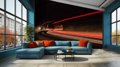 light trails in tunnel. Art image. Long exposure photo taken in Wall mural