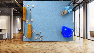 Men's work. The repair tools are on the table. The concept of housework, workshop. Wall mural