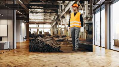 Man working at steel factory Wall mural