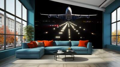 Passenger aircraft takes off from the night airport runway Wall mural