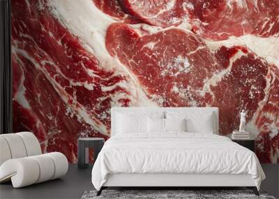 Background or texture of a detailed close-up showcasing the rich marbling of raw beef, with visible fat veins and seasoning Wall mural