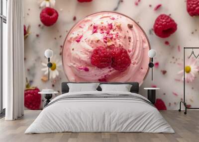 Bowl of pink ice cream with fresh berries on gray marble background. Top view Wall mural