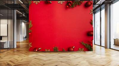 Christmas and Happy New year background with gold glitter decorations on red bright background. Holiday party decoration . Christmas celebration, holiday card Wall mural