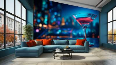 Colorful cocktails in a glass on the bar counter, neon lights on dark night background with lights Wall mural