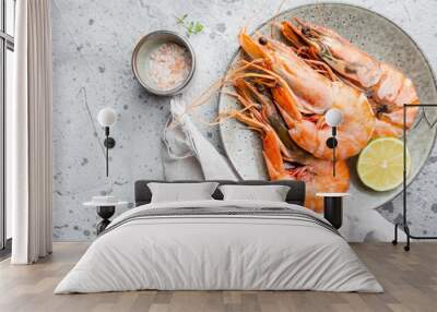 Giant fresh Tiger Prawns on plate over dark stone background, top view Wall mural