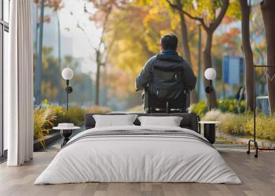 Handicapped or old adult man navigates a sidewalk in an electronic wheelchair, city lights in the backdrop Quality of life and impairment concept. Wall mural