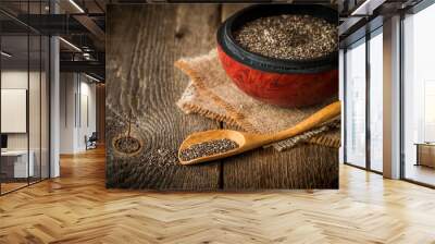 Healthy Chia seeds in a wooden spoon  Wall mural