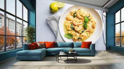 Shrimps in cream sauce with Coconut milk on a plate, top view or view from above, flat lay Wall mural