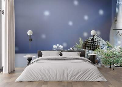 Silver Christmas balls amd snowflakes on shiny background. Christmas greeting card with copy space. Wall mural