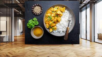 Spicy chicken cooked with curry sauce and rice, top view Wall mural