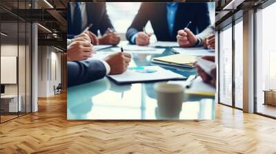 Teamwork, meeting and business people in discussion at the table in modern office for brainstorming and planning. group of corporate employees working on project together in workplace boardroom Wall mural