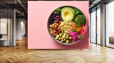 Vegan Buddha or poke bowl salad with buckwheat, vegetables and seeds on pink background Wall mural