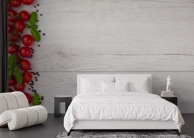 Tomatos, basil and pepper on the white table Wall mural