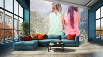 couple of hippie, young people at mountain with longboard skateboard Wall mural