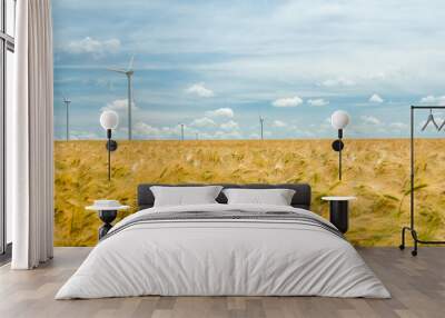 wind turbines and cereal field under summer sky renewable energy eco friendly concept Wall mural